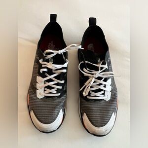 The North Face Men’s Black, Gray and White Athletic Sneakers with Orange Accents